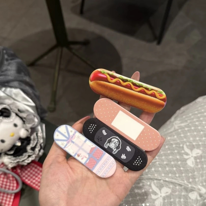 Bandage - Uroczy uchwyt na telefon w kształcie